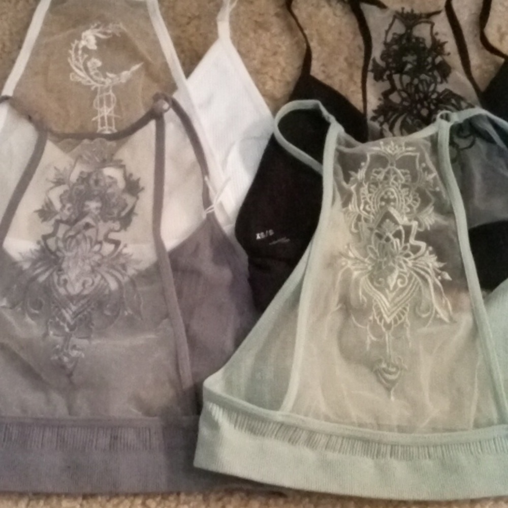 4 tattoo stretchy bras. Sz. Xsm/sm.med/lg Very cute!  New